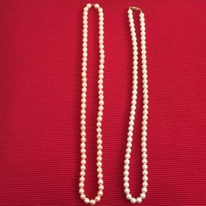 2faux pearl necklaces